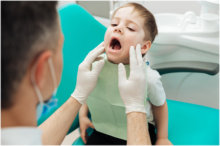 pediatric dentist in Los Angeles examining child